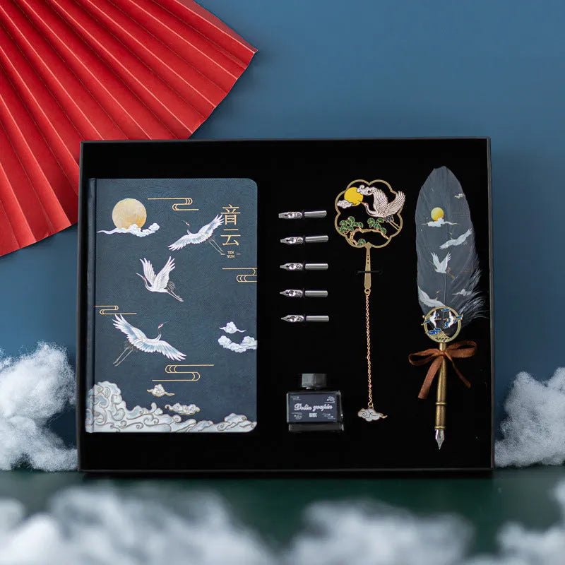 Chinese feather pen calligraphy set with metal sheath, 36 pens, and Jianhegui notebook in gift box.