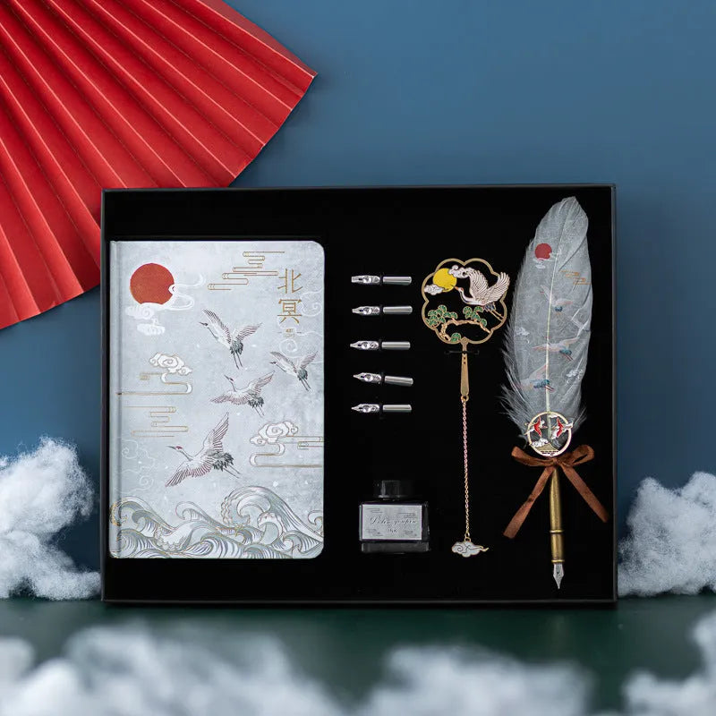 Chinese feather pen calligraphy set with metal sheath, 36 pens, and Jianhegui notebook in gift box.