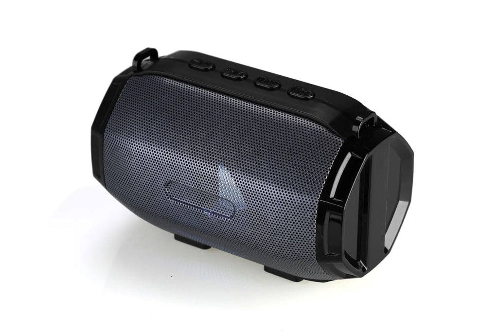 Portable Bluetooth speaker with subwoofer and metal shell in black, gold, and silver gray on a table