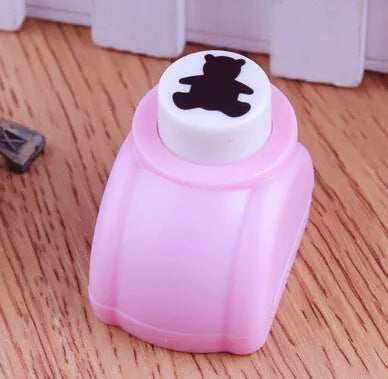 Plastic student stationery embossing device 3x2.5x3cm with decorative pattern