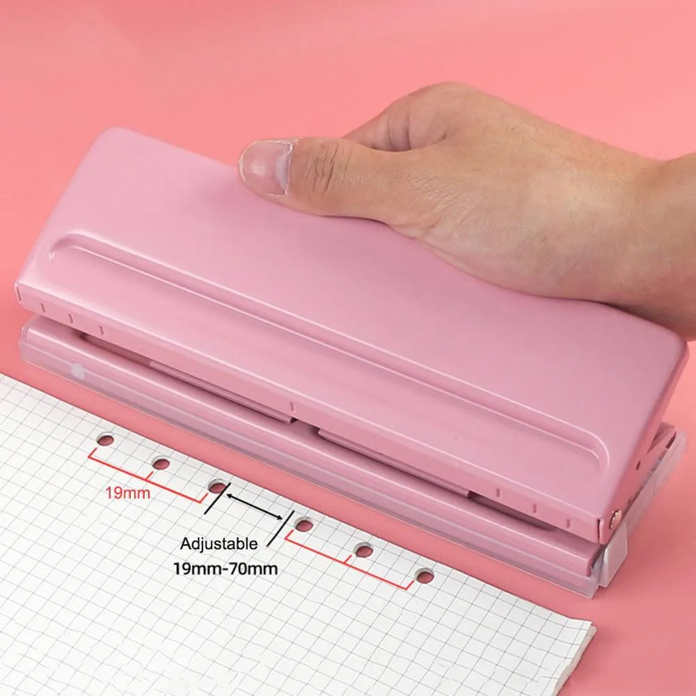 A4 manual puncher for iron ring binding in sky blue, dimensions 120x55x65mm, on a white background