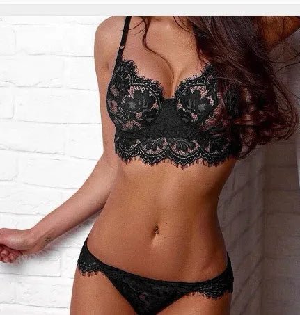 Black mesh lace lingerie set with elasticated panels woman model standing front view