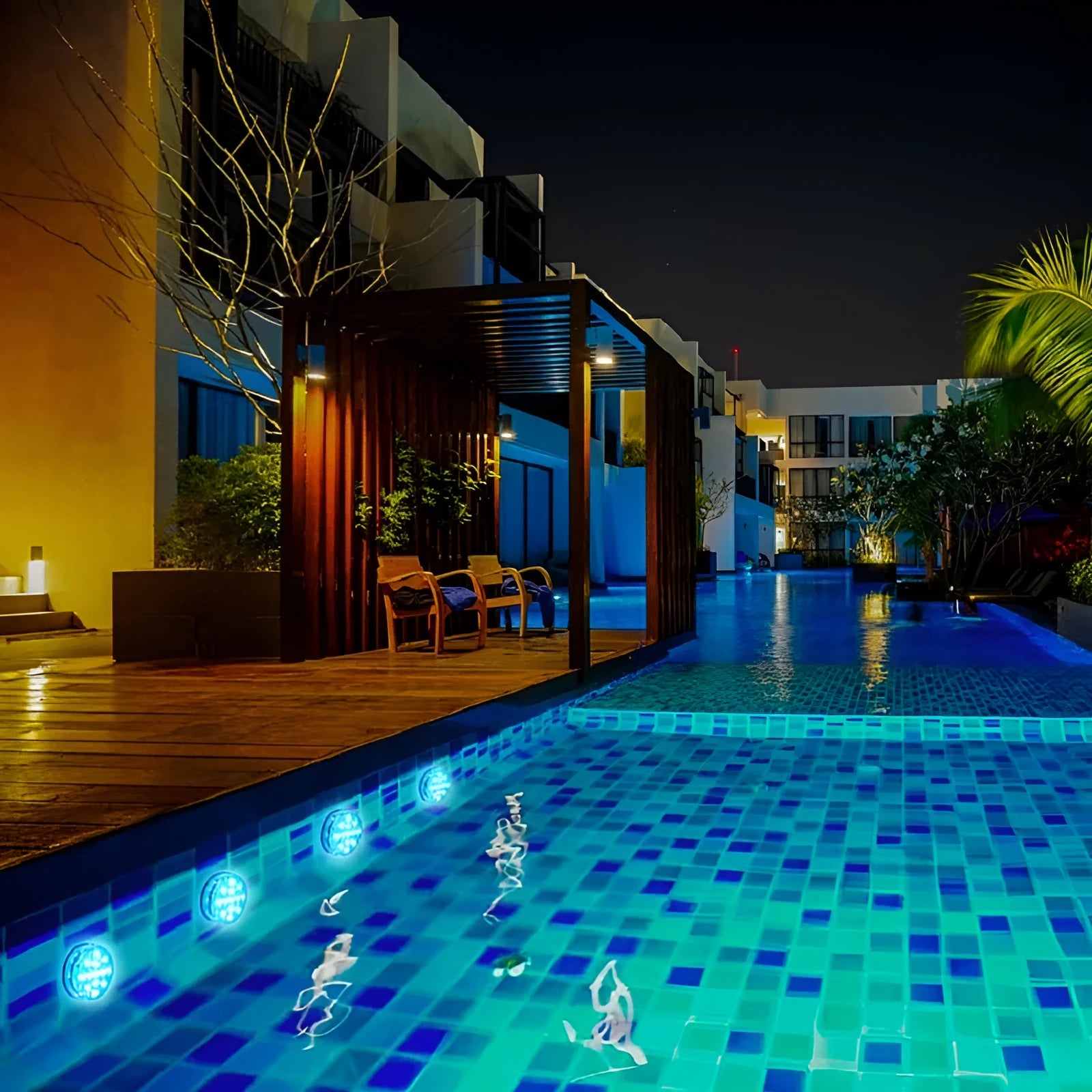 13-LED submersible light with suction cup in pool showing 16 colours
