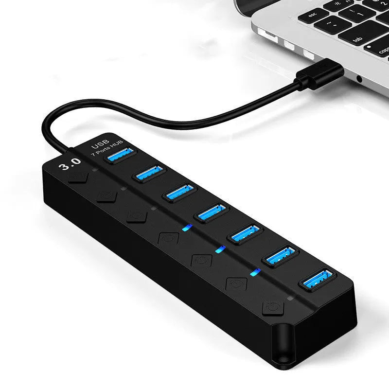 Black 7-port USB 3.0 hub with external power supply for computer connectivity expansion