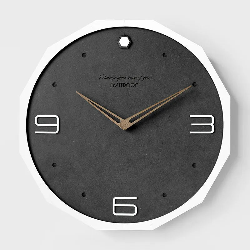 12 inch round Nordic wall clock with perforated face and wooden frame in choice of four finishes