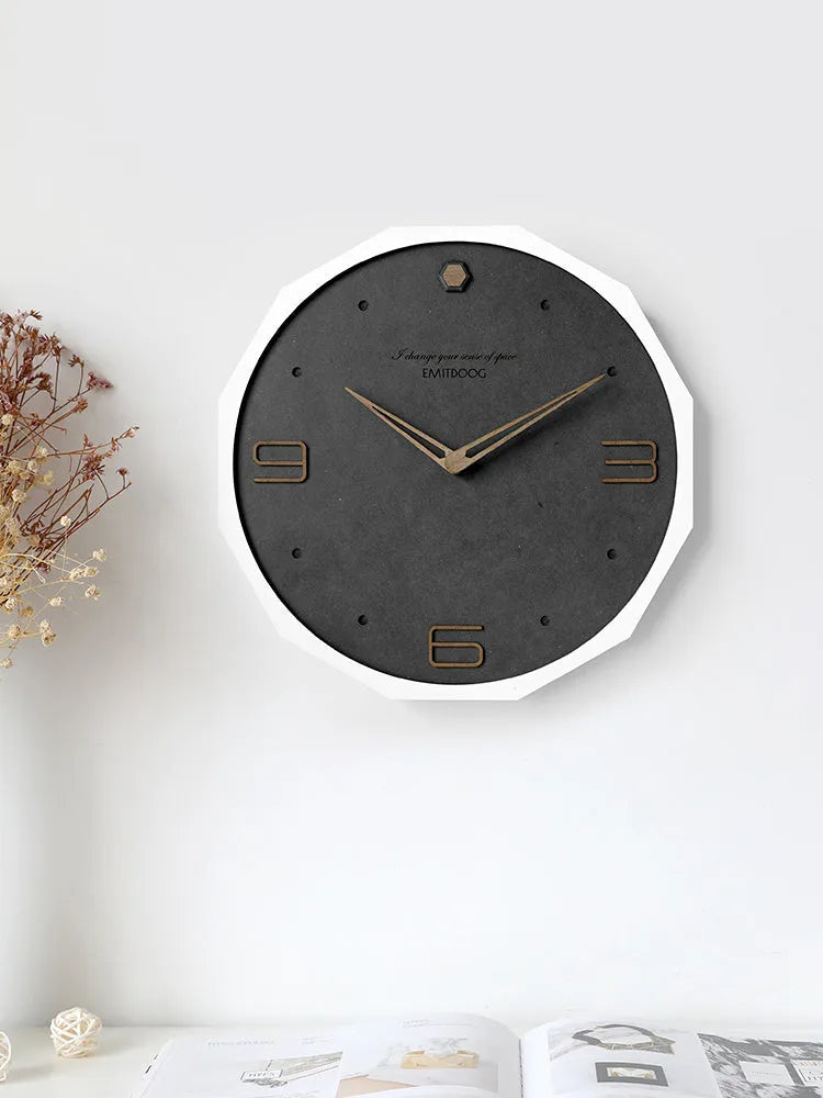 12 inch round Nordic wall clock with perforated face and wooden frame in choice of four finishes