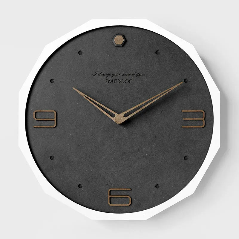 12 inch round Nordic wall clock with perforated face and wooden frame in choice of four finishes