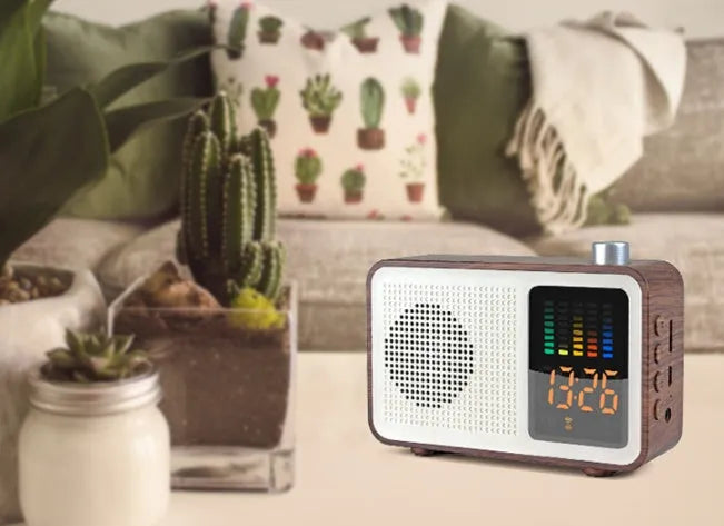 Brown woodgrain retro Bluetooth radio speaker with FM dials and carrying handle