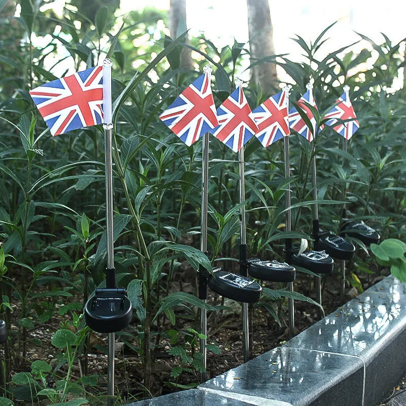 Solar garden flag light with American flag design on stainless steel pole