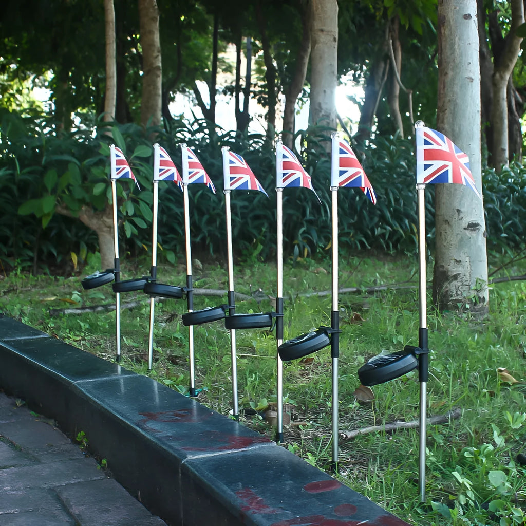 Solar garden flag light with American flag design on stainless steel pole