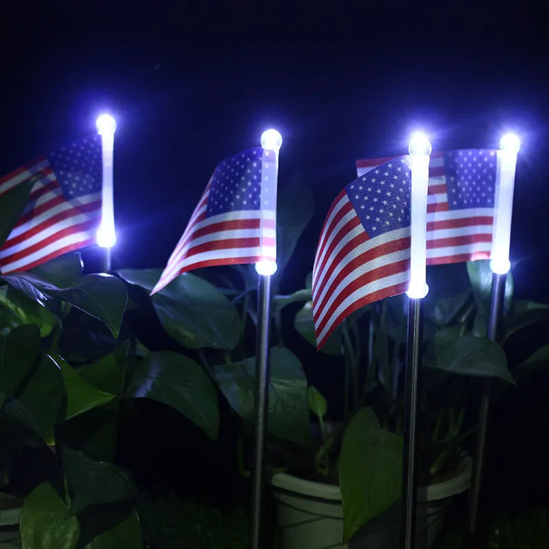 Solar garden flag light with American flag design on stainless steel pole
