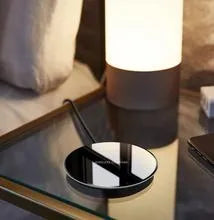Round acrylic wireless charger with private mode, 5W, 100x8mm, in glossy black finish.
