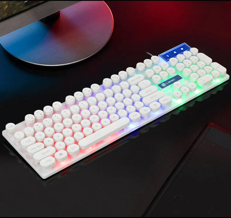 Limei Tx30 retro punk keyboard with rainbow backlight and round key caps, black colour, on a desk
