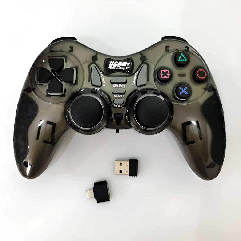 Red and grey wireless PC360 game controller with USB receiver on a desk