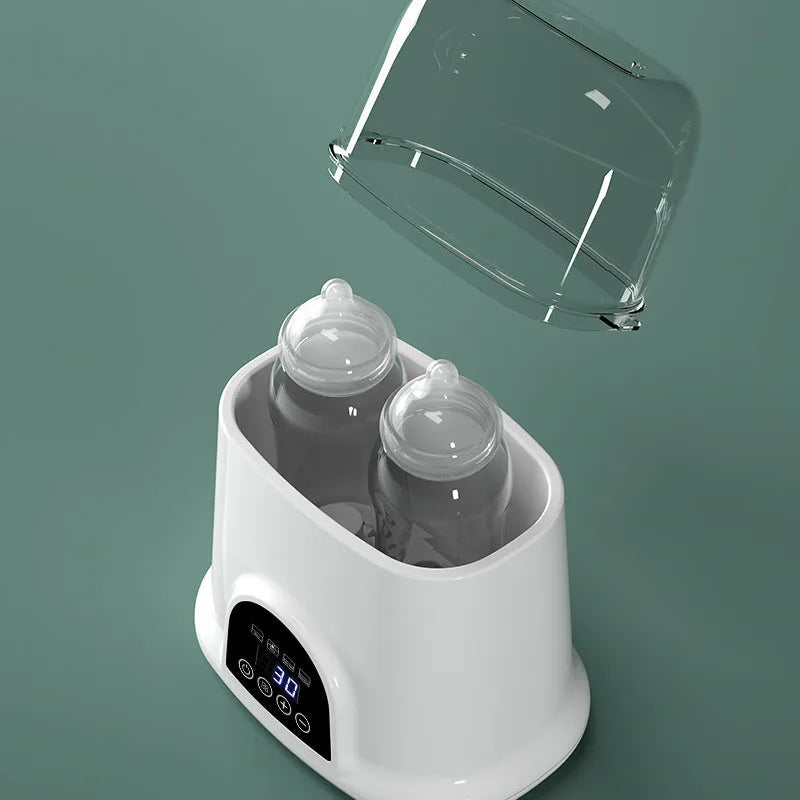 Automatic thermostat milk warmer in white with touch control and steam sterilisation function