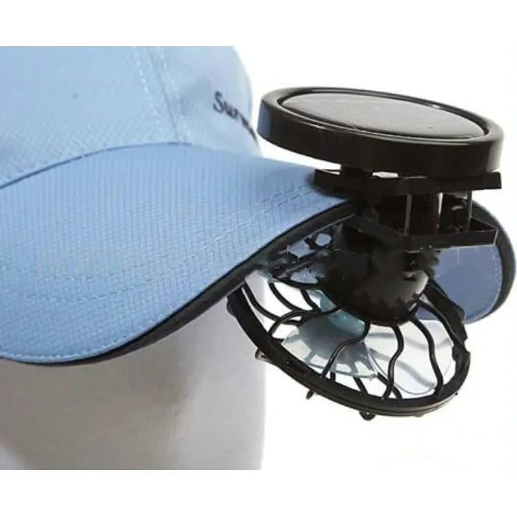 Black portable solar fan with clip-on panel for outdoor cooling during camping and fishing