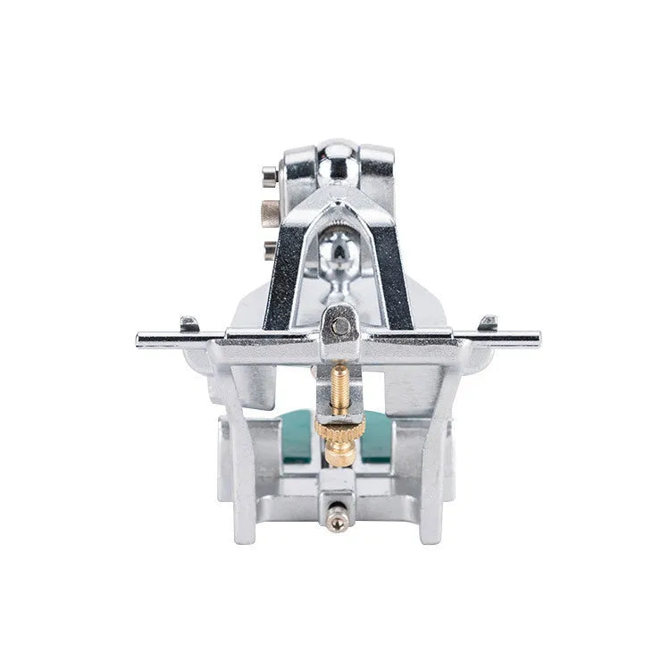 Korean metal dental articulator with adjustable joints for jaw simulation.