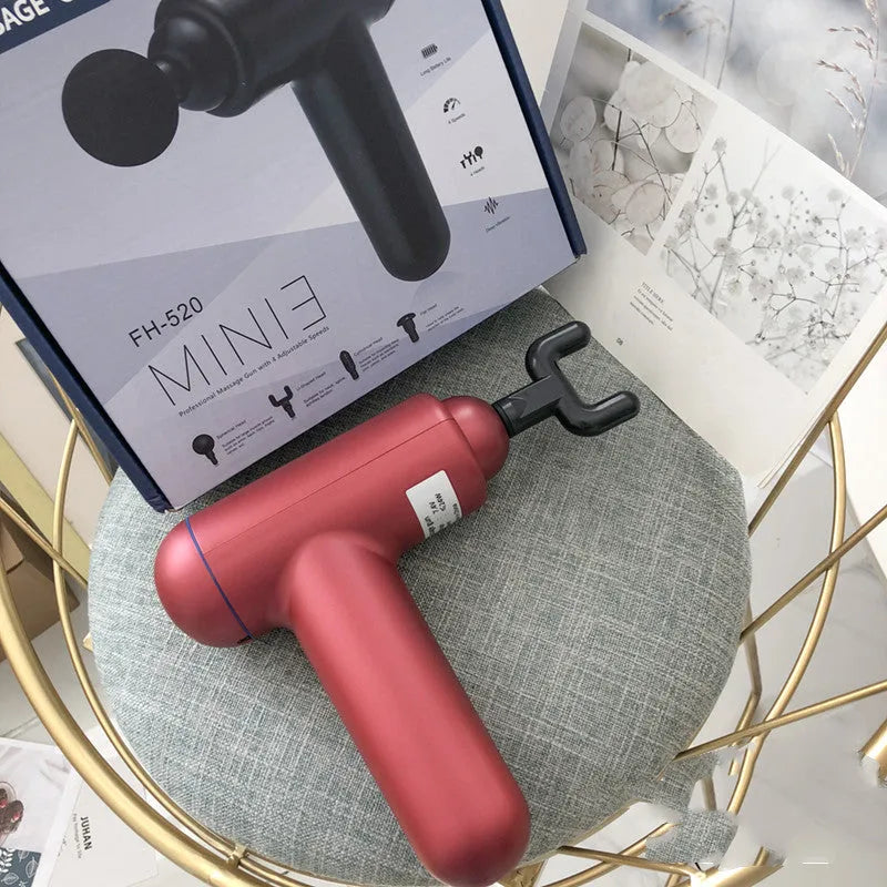 Black fascia gun massager with USB charging port for muscle relaxation