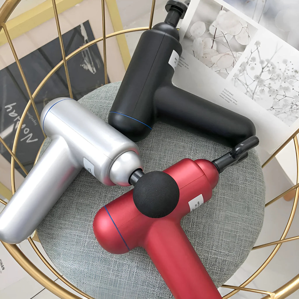 Black fascia gun massager with USB charging port for muscle relaxation