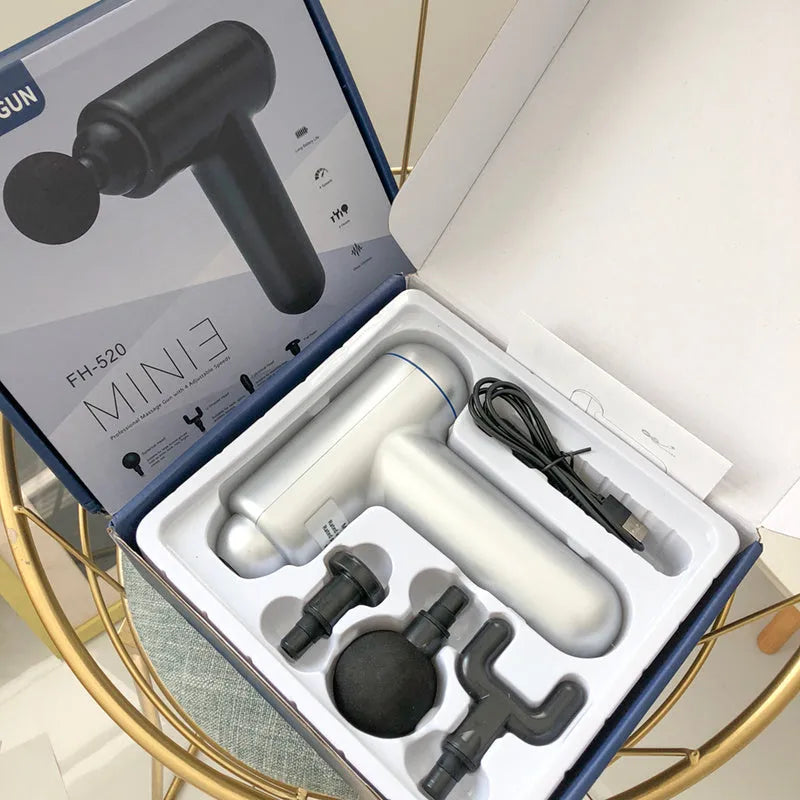 Black fascia gun massager with USB charging port for muscle relaxation