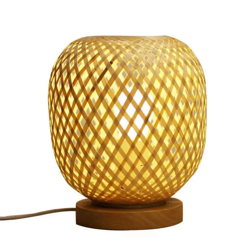 Nordic bamboo woven table lamp with yellow shade on shelf, 18x22 cm metal base