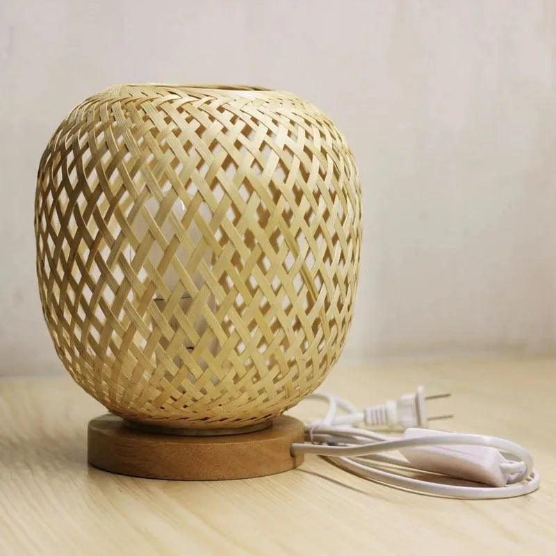 Nordic bamboo woven table lamp with yellow shade on shelf, 18x22 cm metal base