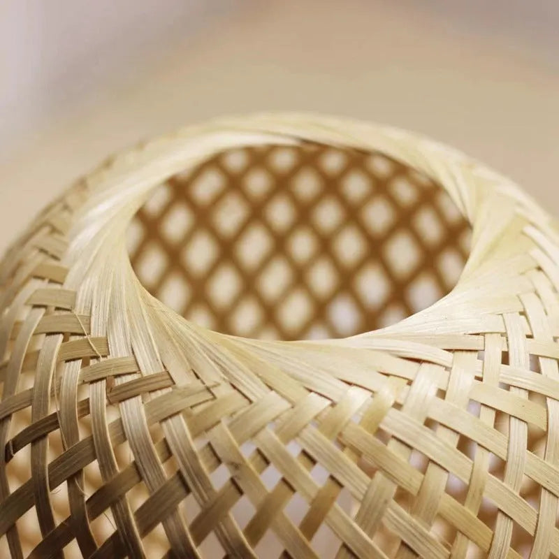 Nordic bamboo woven table lamp with yellow shade on shelf, 18x22 cm metal base