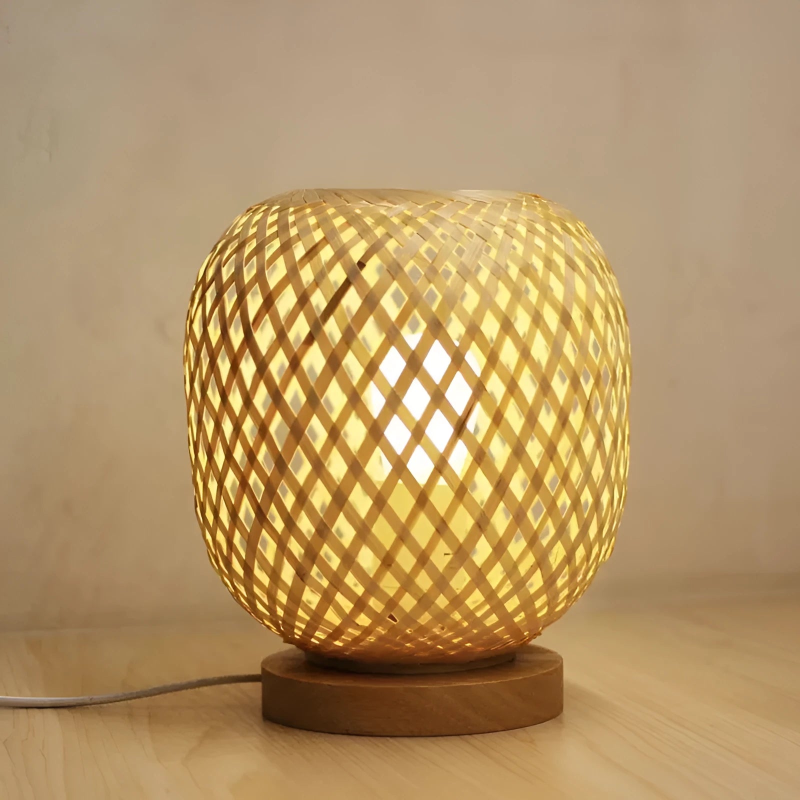 Nordic bamboo woven table lamp with yellow shade on shelf, 18x22 cm metal base