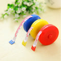 Mini portable plastic measuring tape wound with 150cm metric and city scale, compact 5cm diameter