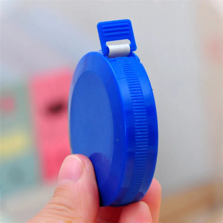 Mini portable plastic measuring tape wound with 150cm metric and city scale, compact 5cm diameter
