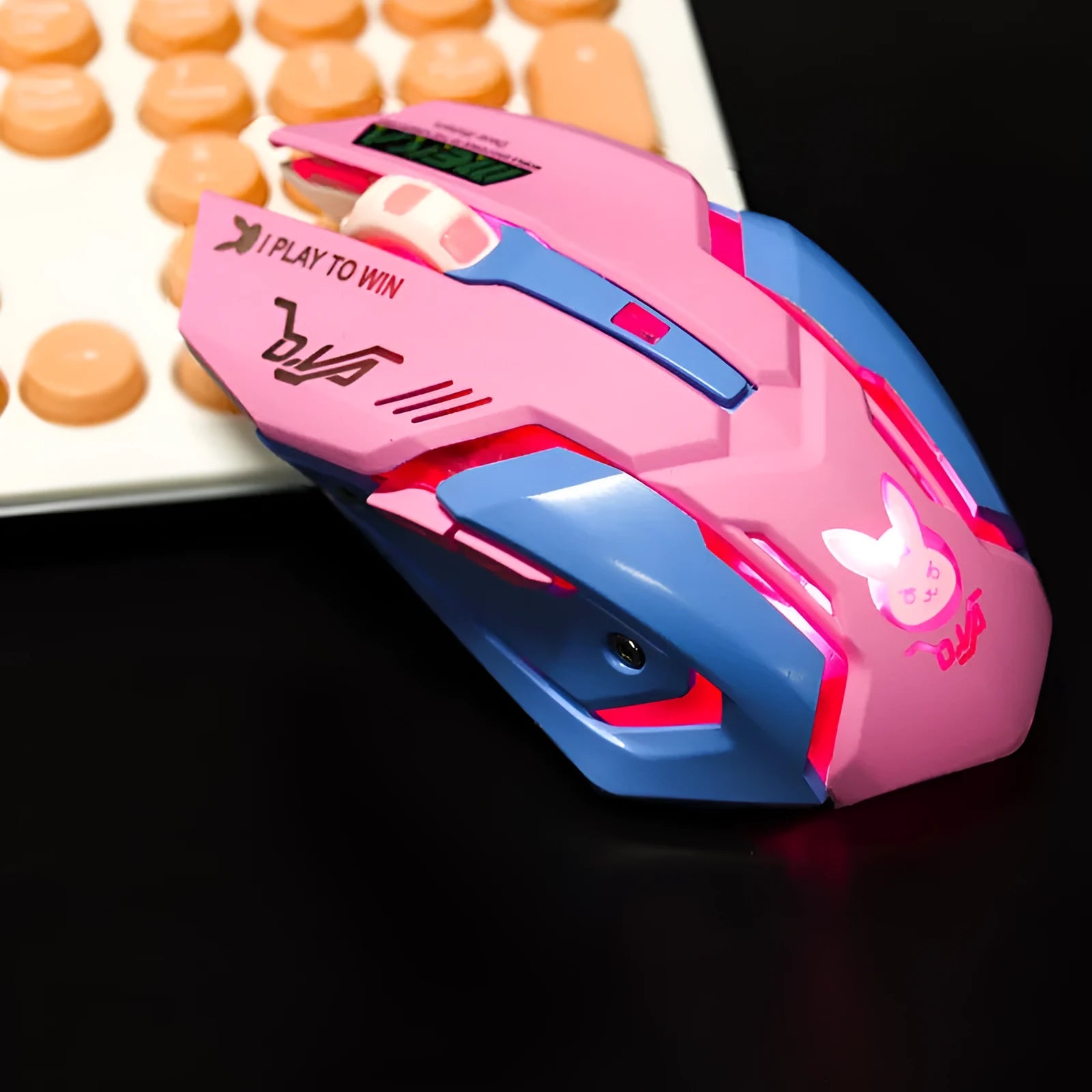 Wireless mute gaming mouse in pink blue colour with 2400 DPI optical sensor