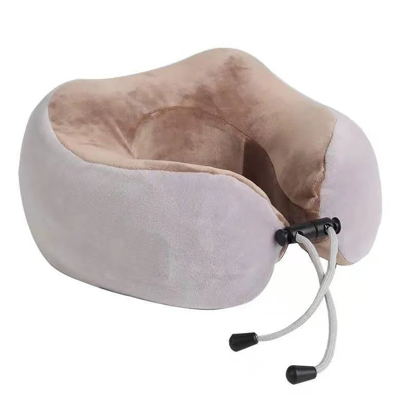 Brown U-shaped electric neck massage pillow with control buttons for kneading and heat functions.