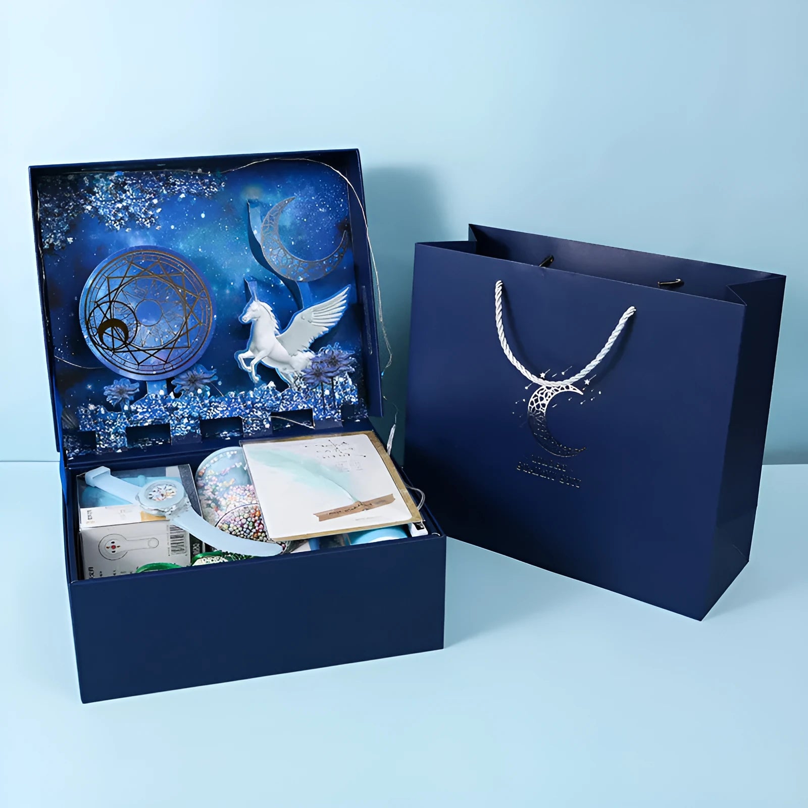 Student stationery set gift box with three-dimensional paper design, Blue and Pink colour options, featuring Lucky Reindeer and Pegasus Starry Sky themes