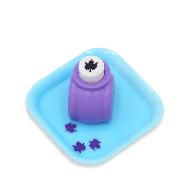 Plastic student stationery embossing device 3x2.5x3cm with decorative pattern