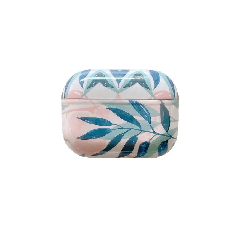 Blue and green soft TPU AirPods cases featuring a painted tropical banana leaves pattern.