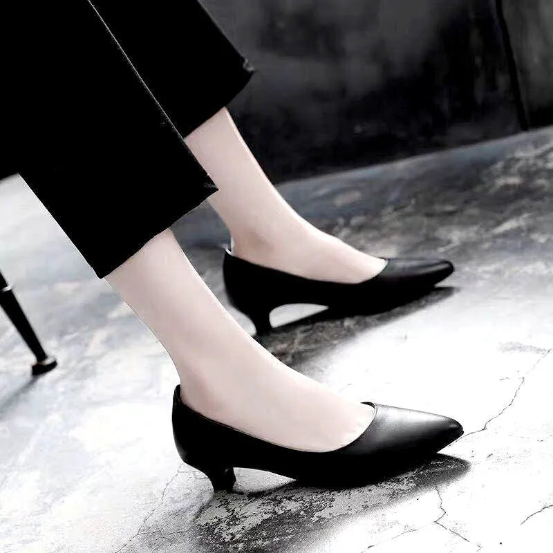Women's silver and black stiletto wedding shoes with crystal details on a PU leather upper