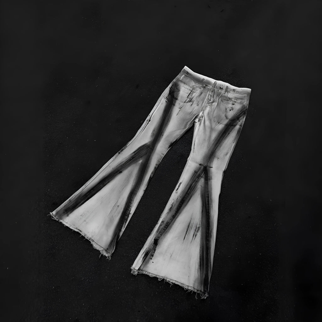 White mid-waist cotton denim jeans with heavy selvedge detailing and black ribbon gradient across legs