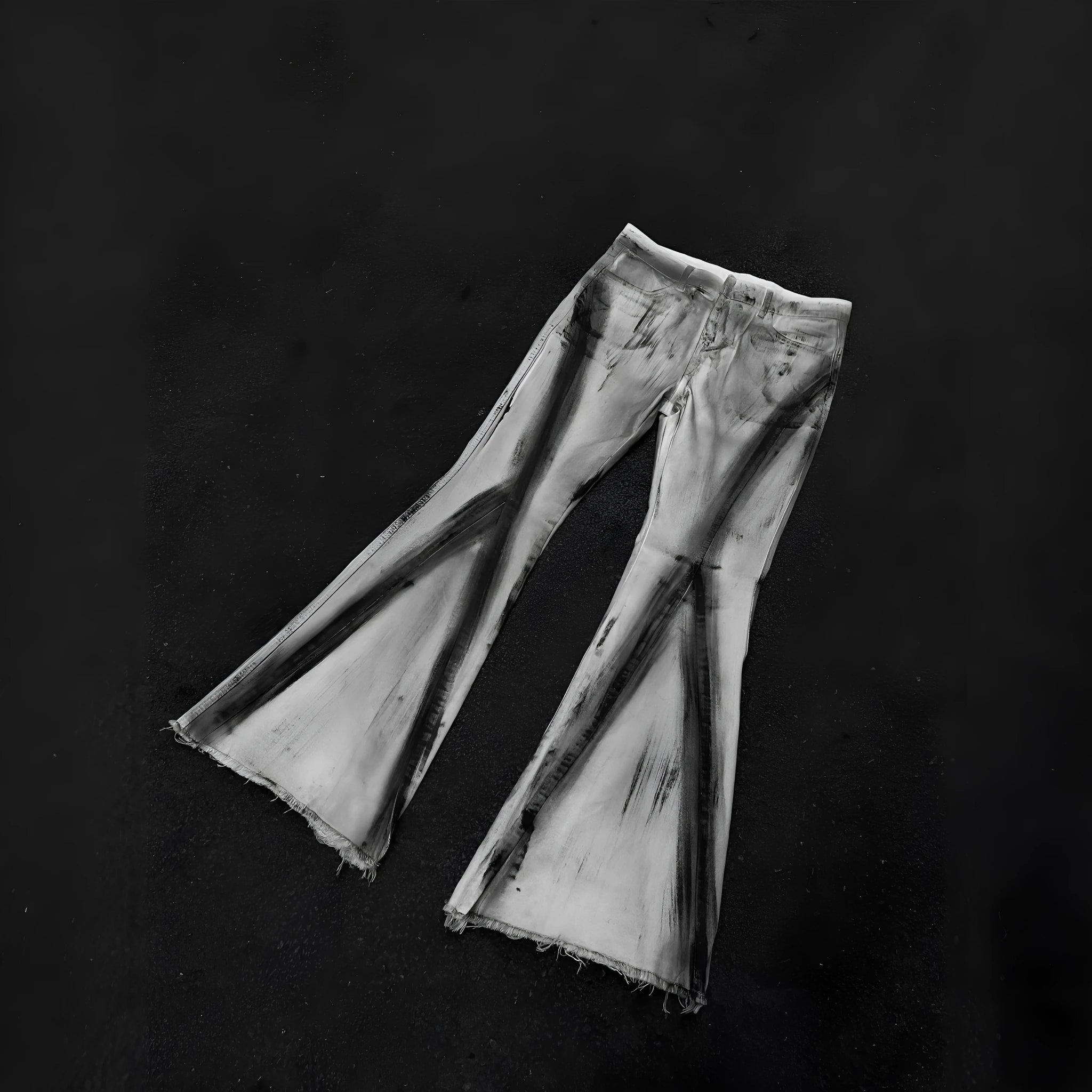 White mid-waist cotton denim jeans with heavy selvedge detailing and black ribbon gradient across legs