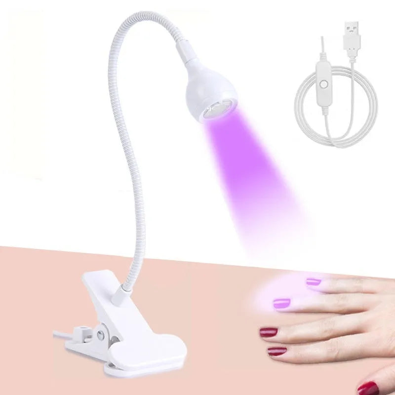 Goose neck nail lamp with USB clip, 395nm purple light curing UV glue on nails in a home manicure setting.