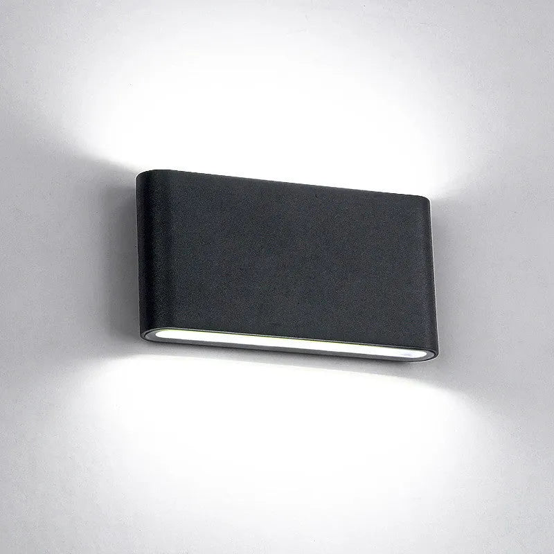 Waterproof aluminium wall lamp in black finish for balcony or aisle use with warm white light output