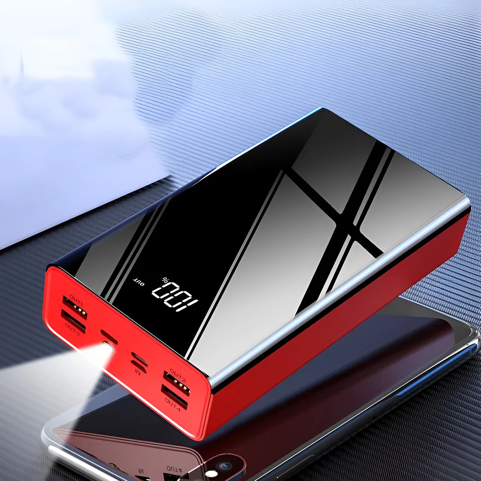 Large 40000mAh capacity power bank with LCD display in red and black plastic case