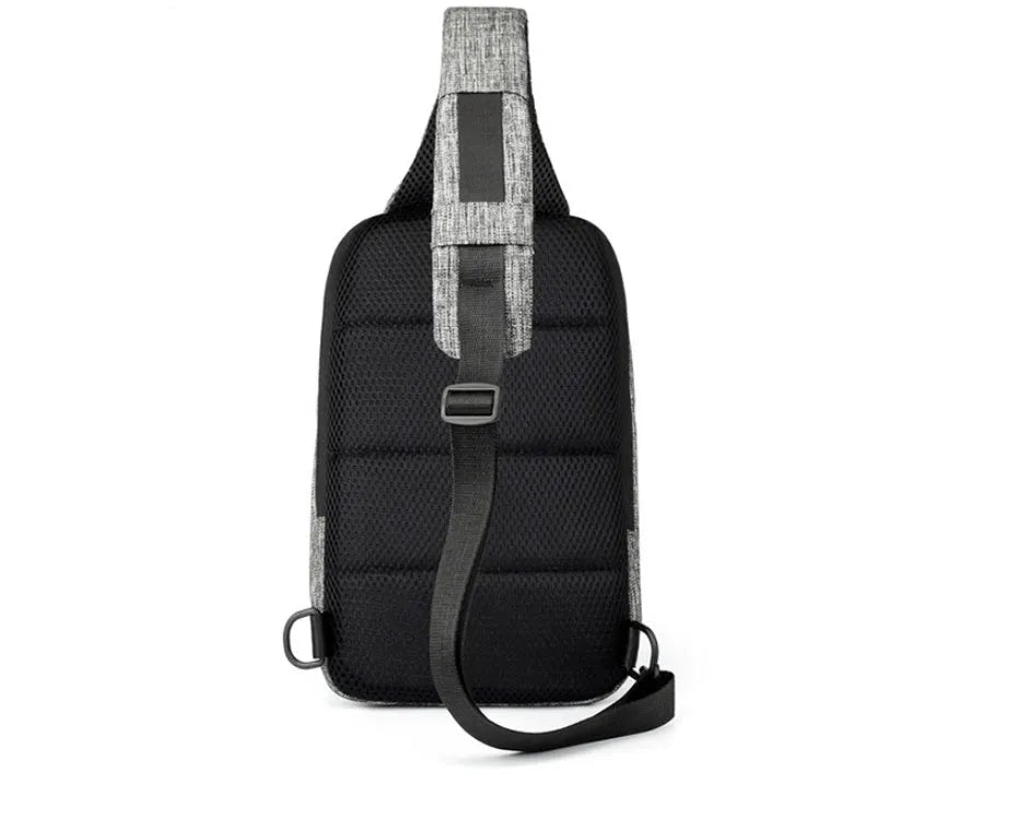Small dark blue Oxford cloth chest bag with zipper closure showing internal phone compartment