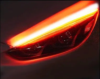Car LED daytime running light strip in silicone waterproof casing with flowing turn signal effect