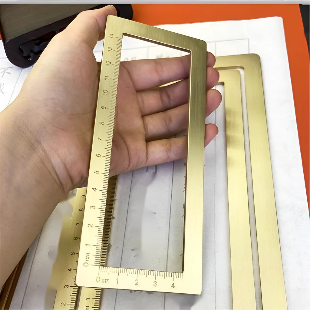 Solid brass calligraphy paper weight with carved square design for paper pressing