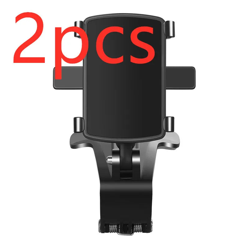 Black car phone holder mounted on dashboard with smartphone in clip