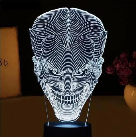 USB-powered 3D acrylic LED table lamp showing multiple colour options and remote control.