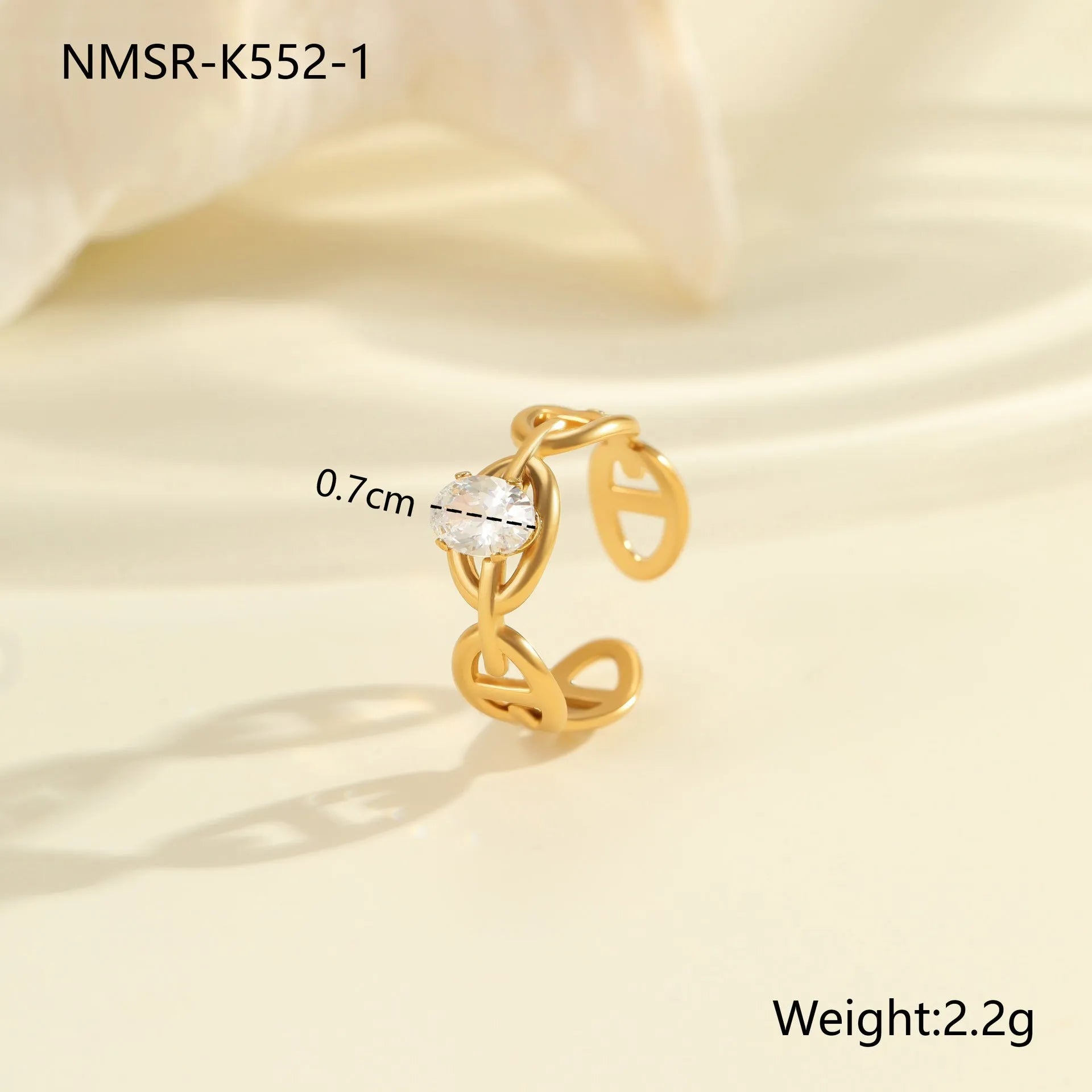 Adjustable geometric stainless steel ring showing open mouth design and colour variations