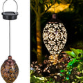 Outdoor waterproof solar hollow lamp made of iron with polysilicon solar panel, 10x10x60cm, warm white light