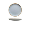 Blue matte ceramic dinner plate 10 inches with sesame point glaze on a table