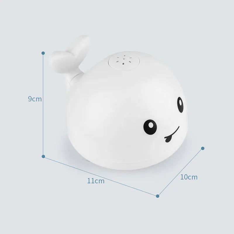Automatic water-sensing whale bath toy with spray, lights, and music functions for baby bath time